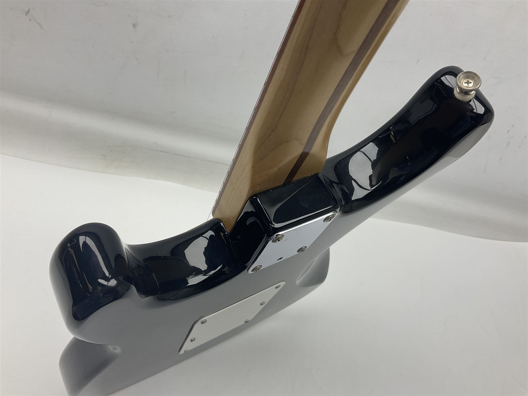 Mexican Fender Stratocaster electric guitar in black c2003 with Floyd Rose tremolo system, serial no.MZ3129600; L98cm; in Freestyle fitted case with 2006 Diamond Anniversary booklet