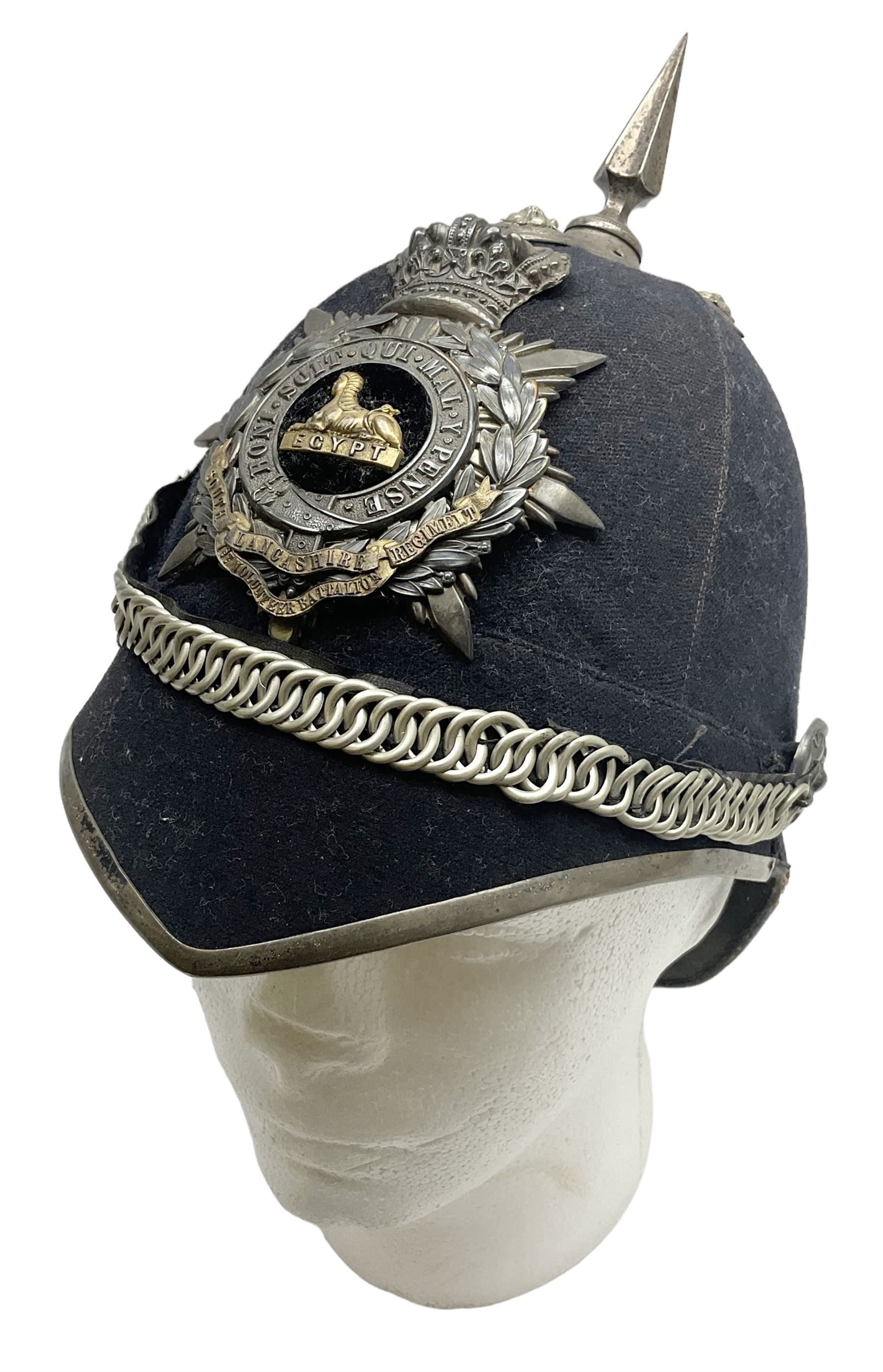 Victorian British Army South Lancashire Regiment 1st Volunteer Battalion other ranks blue cloth home service helmet with helmet plate, spike and chinstrap