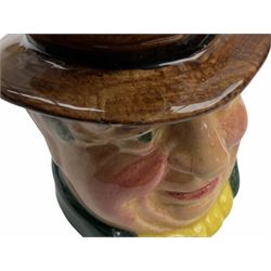 Character and toby jugs, including a staffordshire pottery style toby jug, Olfaire toby jug, Beswick character jug depicting Scrooge, Royal Doulton Veteral Motorist etc, together with Royal Doulton Sweet Dreams figure. 