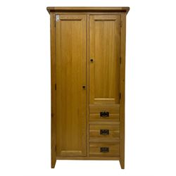 Light oak combination wardrobe, fitted with full-height compartment, single cupboard and three small drawers