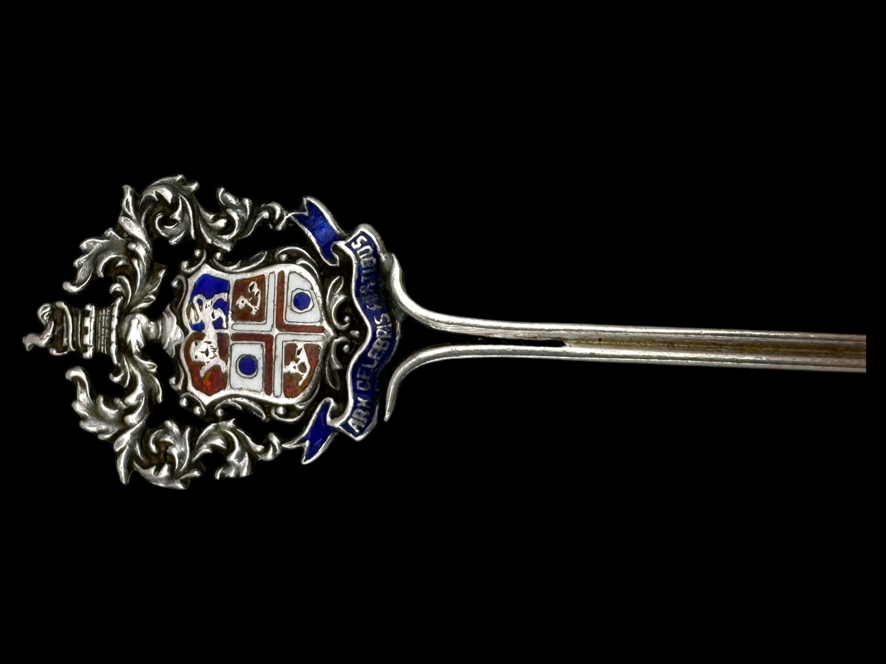 Three silver decanter labels and a collection of silver and silver plated cutlery