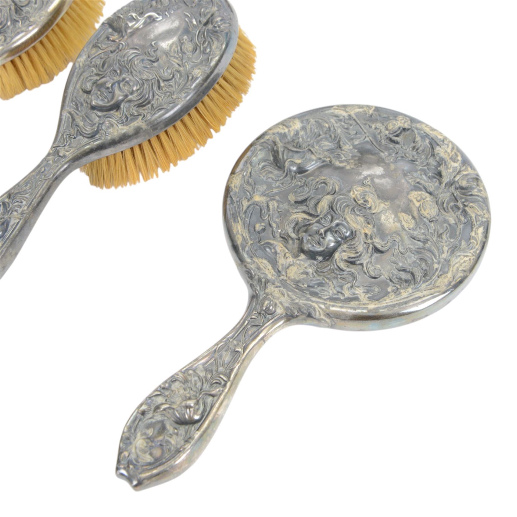 Derby Silver Co, Art Nouveau silver plate dressing table set, comprising mirror and two brushes, together with a silver silver plated box, the box marked B&W to the base, box H13cm