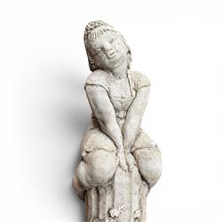 Pair of weathered composite stone garden figures, modelled as a girl and a young satyr playing the panpipes seated on column supports, the fluted columns with climbing ivy vines and surmounted animal, butterfly and other zoomorphic motifs