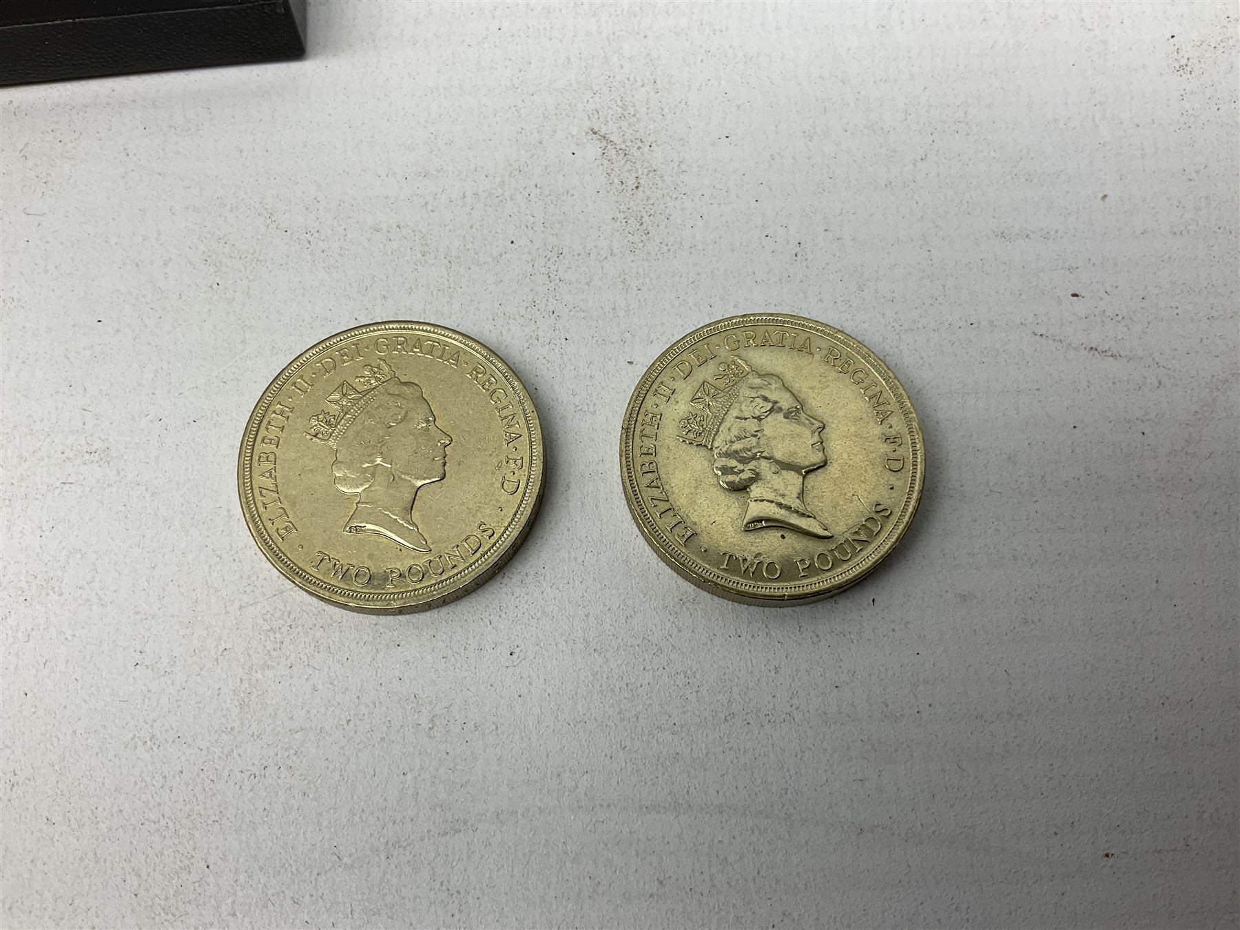 Great British and World coins including Queen Victoria 1887 and 1888 double florins, King George V 1929 halfcrown, King George VI 1951 Festival of Britain crown, commemorative crowns, Queen Elizabeth II 1953 nine coin set in blister pack, 1989 and 1995 two pound coins, various pre-decimal pennies and other coinage