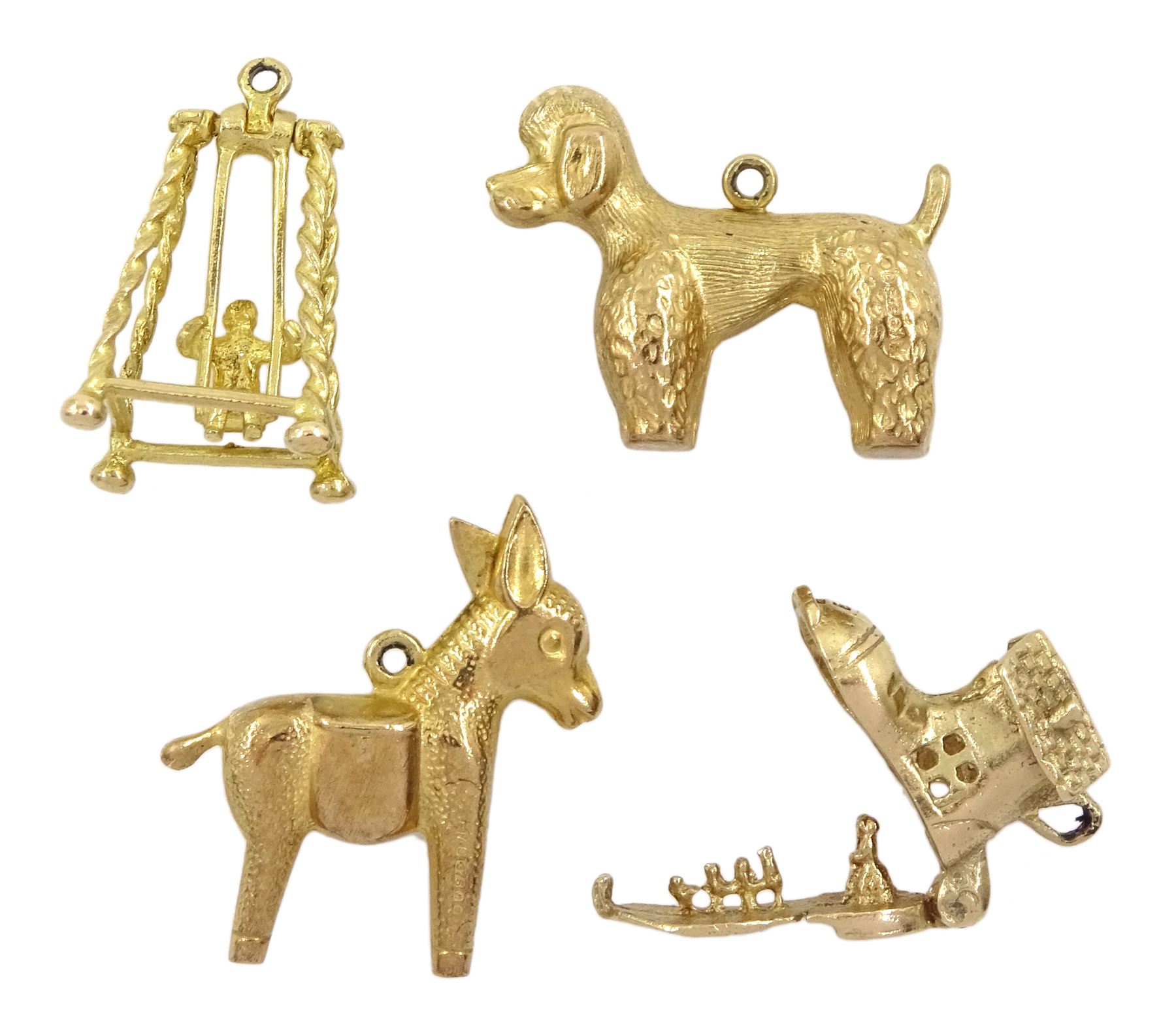 Five embossed copper plaques of rectangular form decorated with medieval knights, mounted upon ebonsied backs. 