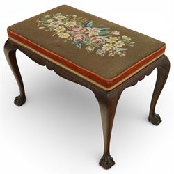 Georgian style mahogany dressing stool, rectangular upholstered top embroidered with a floral needlework panel within a velvet border and braid trim, moulded frieze, raised on cabriole legs terminating in large carved claw and ball feet