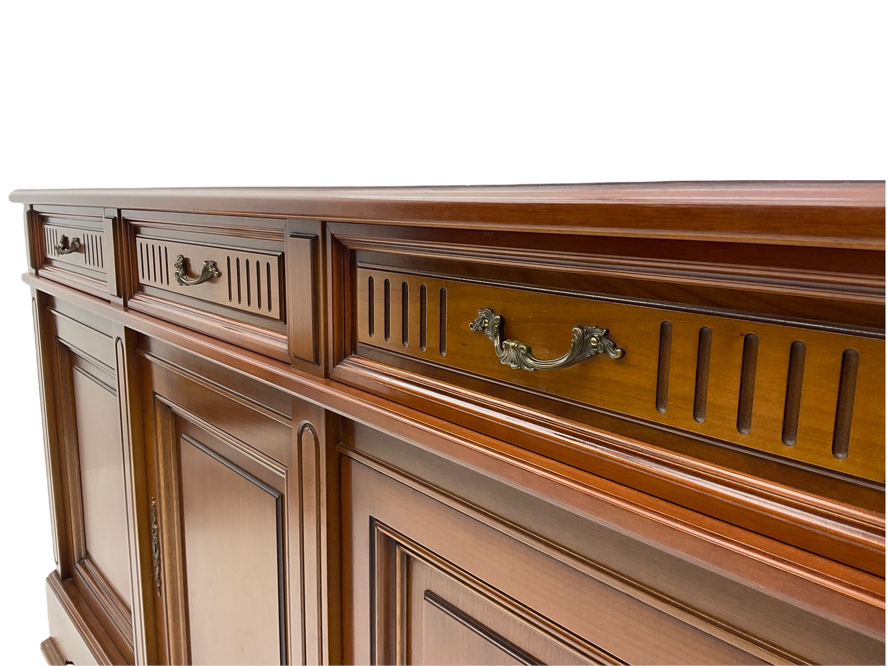 Contemporary cherry wood sideboard, rectangular moulded top over three drawers and three cupboards