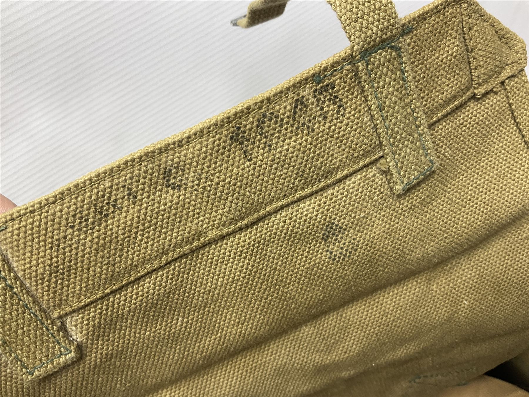 Two post-WWII British Army No.2 Dress tunics, one with Green Howards buttons; army shirt dated 1951; Royal Fleet Auxilliary jacket with trousers; three RAF/WAAF uniforms and RAF Greatcoat; and three canvas/webbing bags, two dated 1943 & 1945