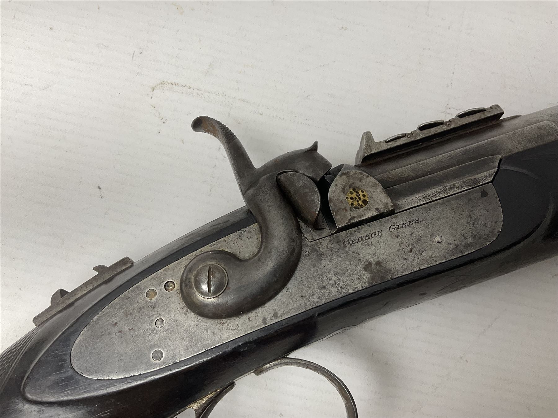 19th century George Gibbs of Bristol .461 cal. muzzle loading percussion match rifle with 28cm cut-down barrel and cut-down stock, Metford type rifling, fitted with additional three folding leaf rear sight to 400yds, back action sight still fitted to tang, maker's name to lock and top of barrel, serial no.439. L46.5cm overall