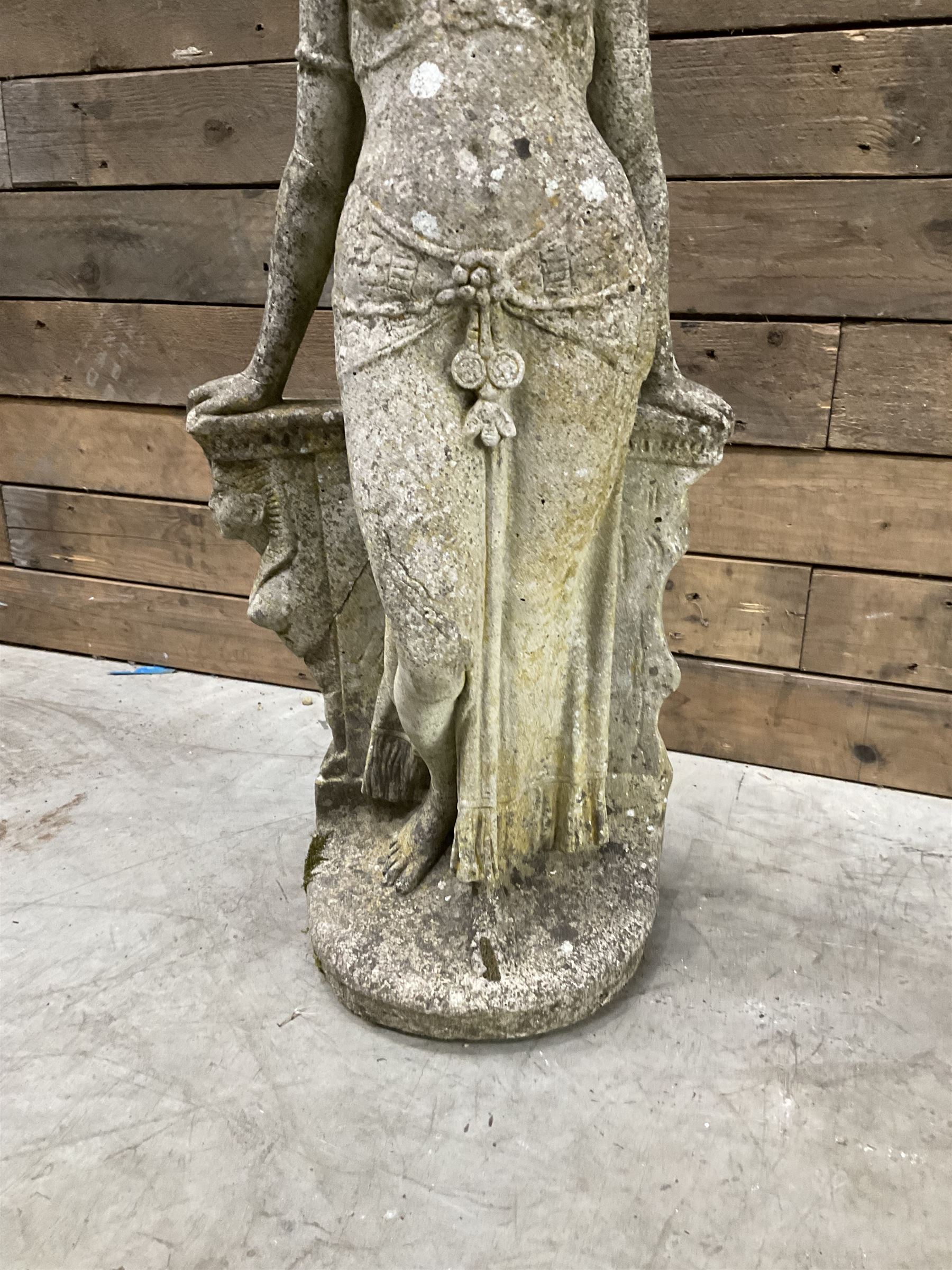 Pair of cast stone garden dogs and 2 female figures,