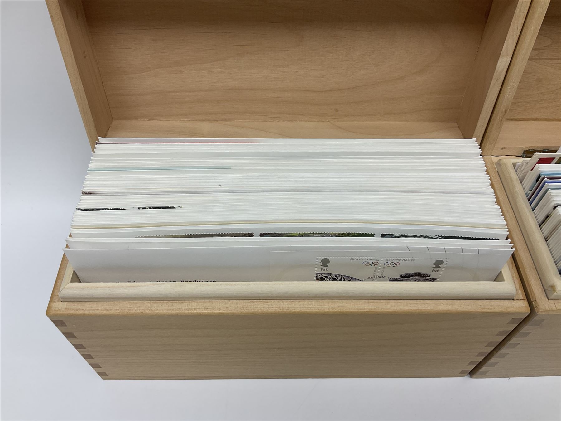 Coins and stamps, including The Royal Mint Great Britain 1970 coin set in plastic holder, 2006 'Brunel' coin cover containing two commemorative two pound coins, Alderney 2006 sterling silver proof five pounds, two 2007 five pound coins in card folders, two limited edition mint first class stamp sheets each comprised of ten first class stamps, various first day covers many with special postmarks housed in 'Royal Mail' boxes etc