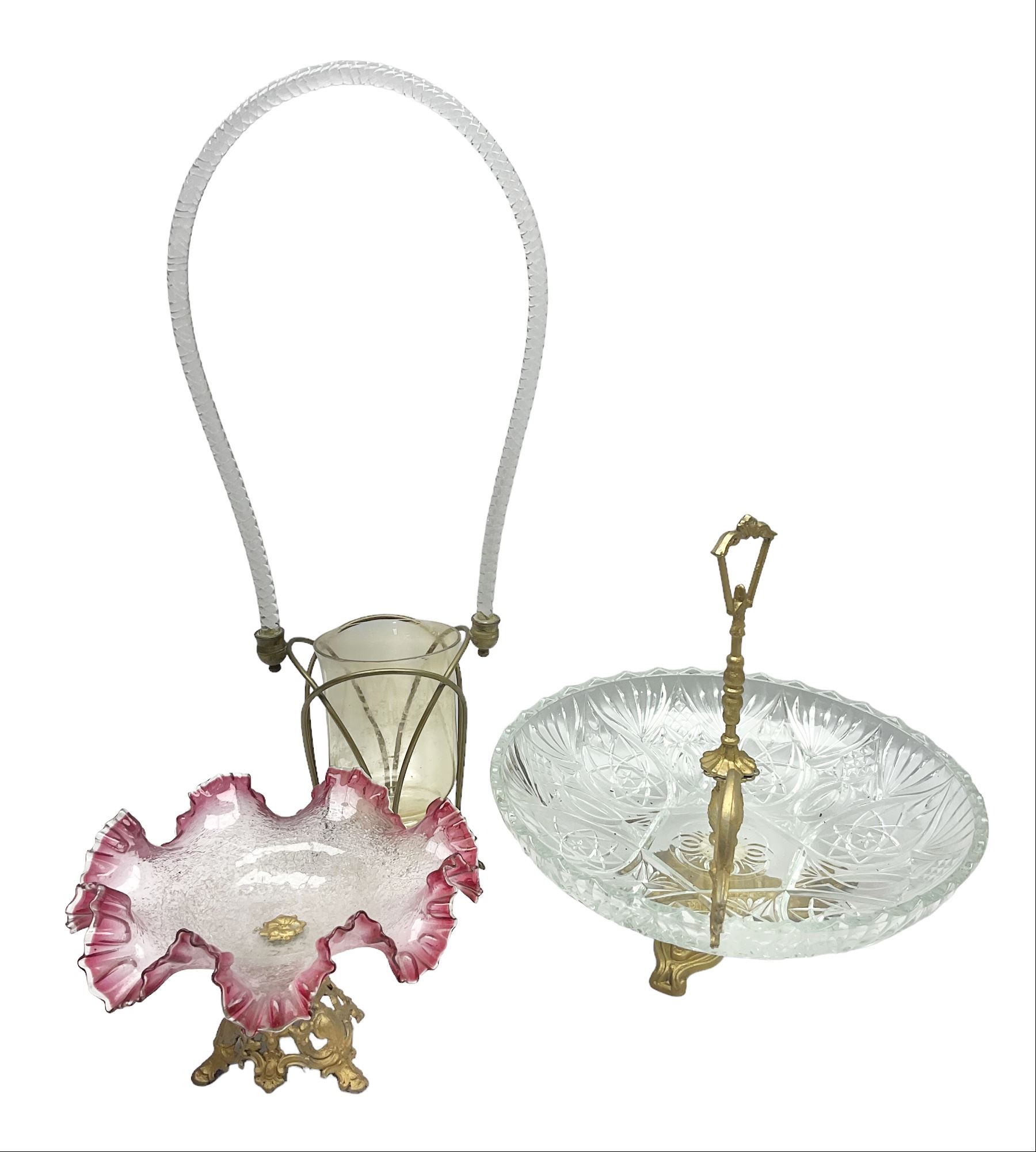 20th century moulded glass and gilt centre piece bowl with carrying handle and ornate trefoil base, together with frilled cranberry edge glass comport with ornate gilt base, and further centre piece with  large glass handle of twisted form, tallest H54cm