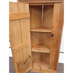  19th century waxed pine wall niche corner cupboard, rectangular moulded front with plank door, corner interior with two shelves, wrought iron strap hinges and latch, W76cm, H150cm, D39cm  
