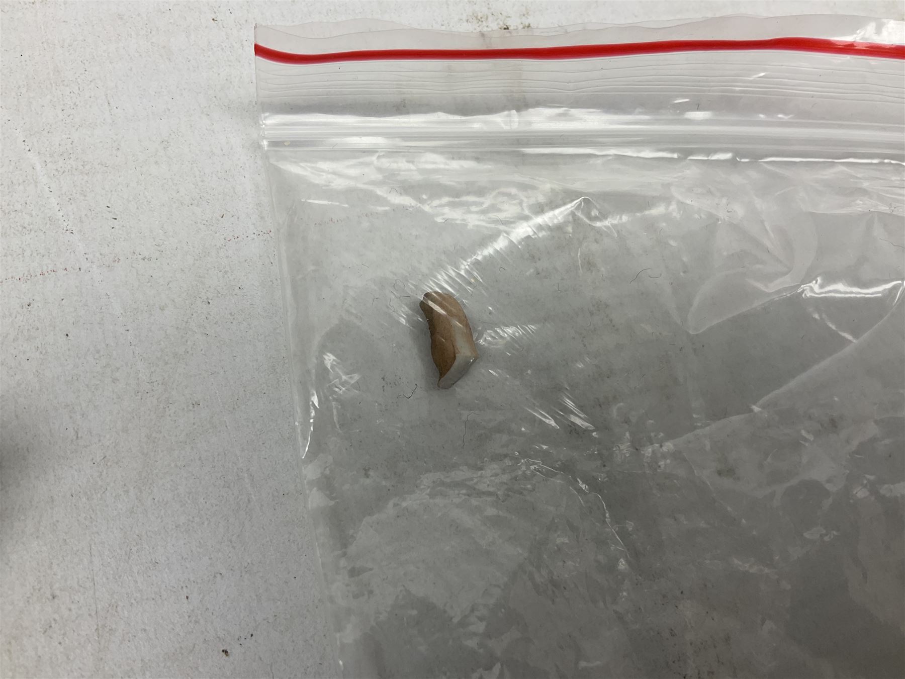 Four Capodimonte figure groups, to include tramp figures, shoemaker figure etc