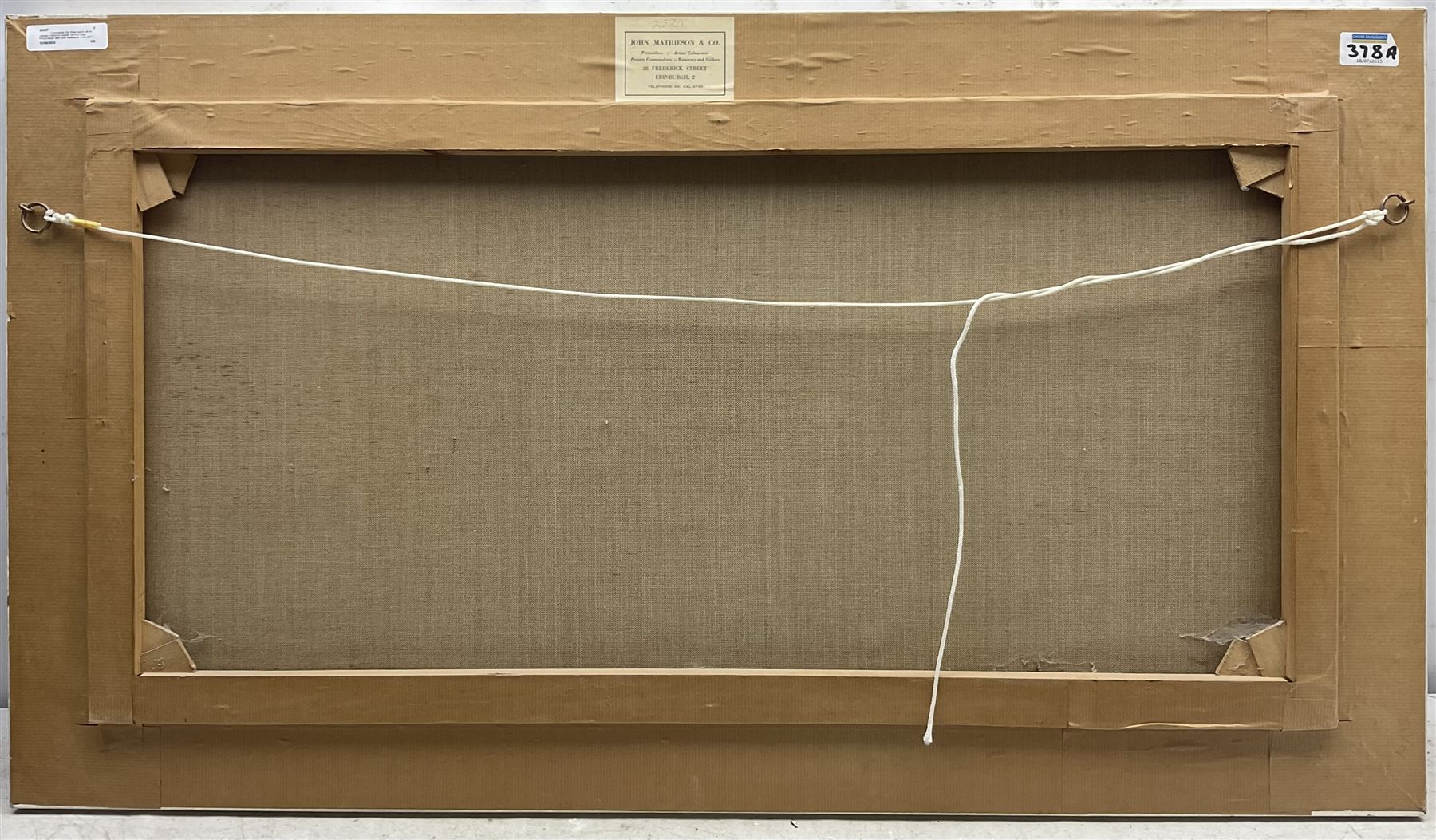 Continental School (Mid 20th century): City River scene with Commercial Barge, oil on canvas indistinctly signed 38cm x 78cm
Provenance: with John Mathieson & Co, 20 Frederick Street, Edinburgh, 1950/60's label verso