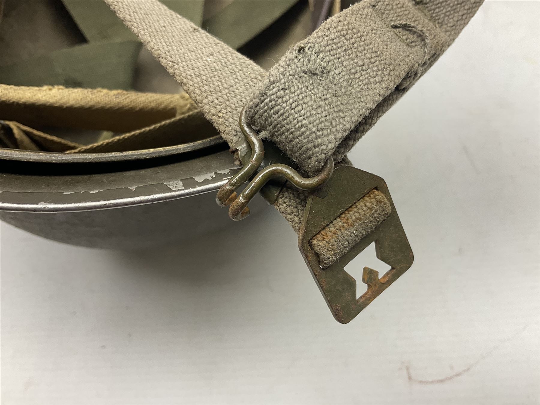 French Algerian War Red Cross steel helmet, marked 'CP ICA Esperaza 1955'; green finish with crudely painted Red Cross logo to the front