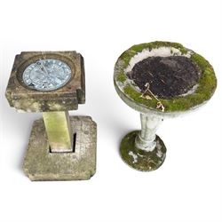 Weathered cast stone birdbath, circular bowl over a lobed baluster pedestal on circular base; weathered cast stone sundial of squared form with re-entrant corners and removable metal sundial with personified death motif