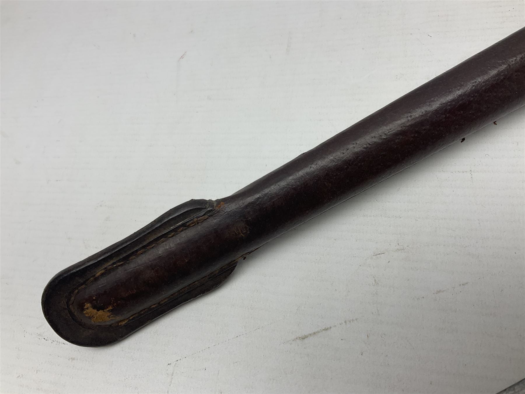 WWI 1821 pattern Royal Artillery officer's sword, the 82.5cm decorative blade by Hawksworth Sheffield etched with GVR cypher and crown, 'Royal Artillery' and field gun between scrolling foliate panels; three-bar hilt with wire-bound fish skin grip and chequered backstrap; in leather covered scabbard L99cm overall