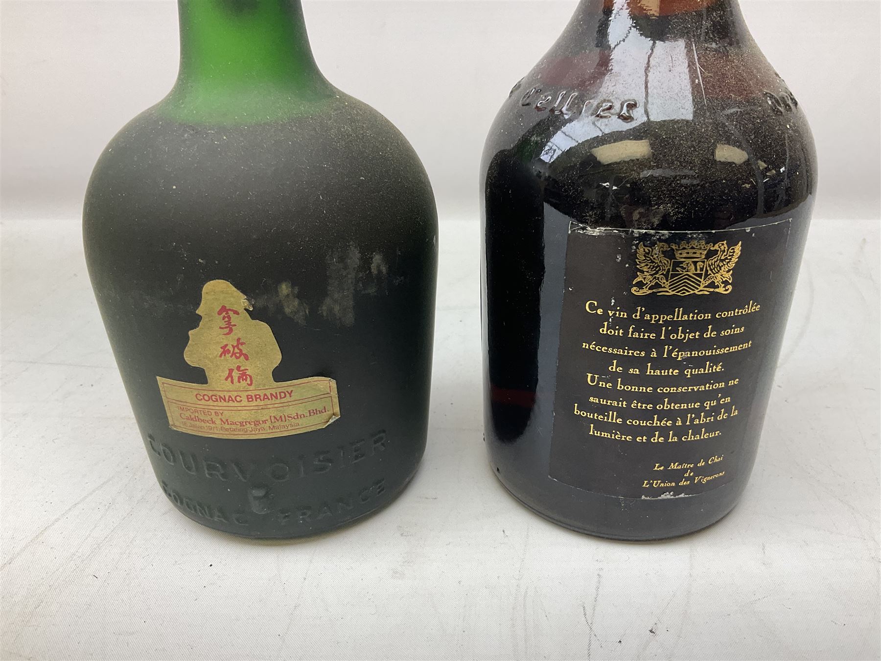 Mixed alcohol including, Carte Noire Cellien des Dauphins 1990 red wine, 75cl 13.5% vol, Dujardin Golden Keys blended grape brandy, contents and unknown proof, Special Reserve fine Scotch whisky, 1l, 43% vol and two others of various contents and proof 