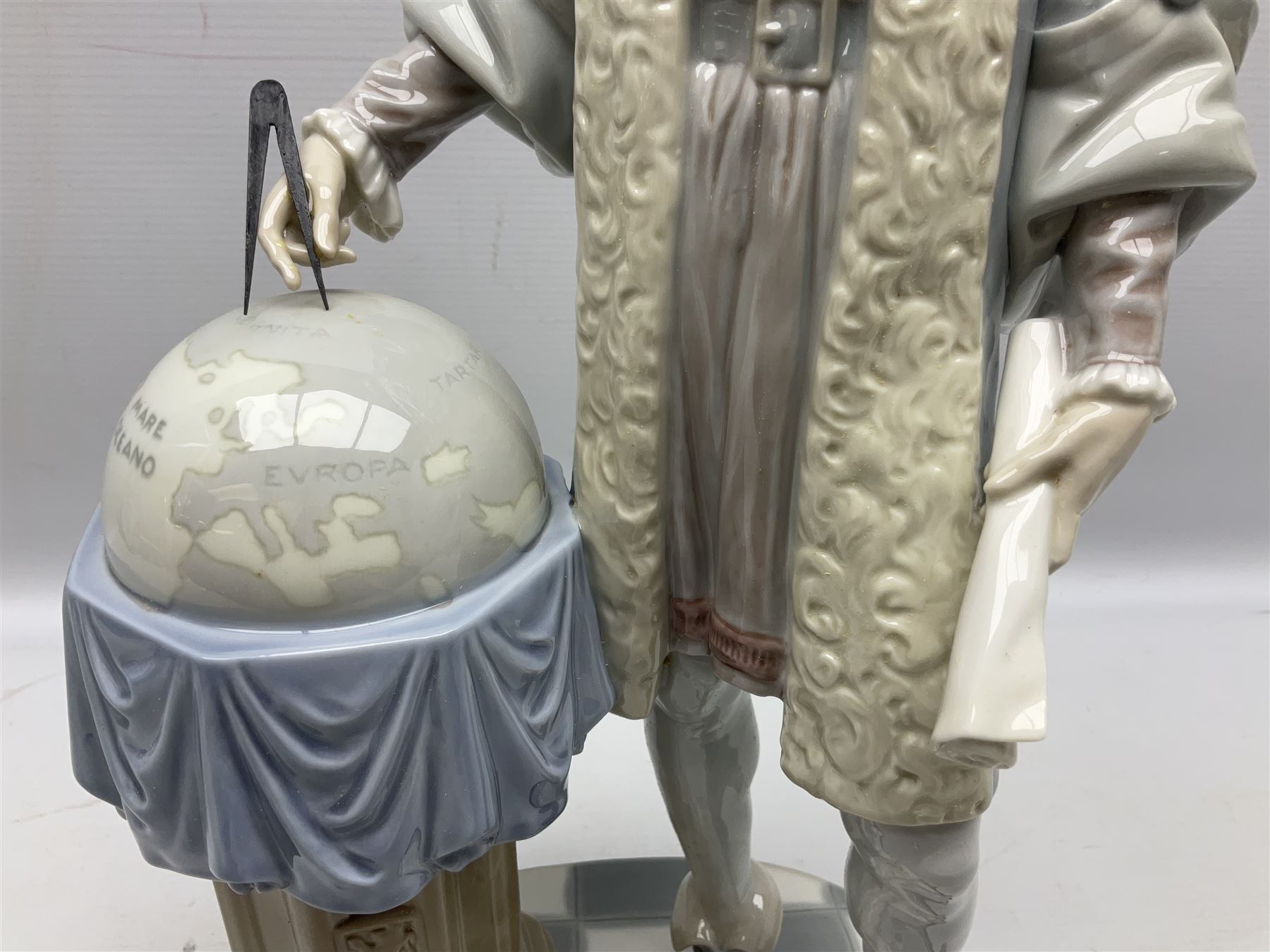 Lladro figure, Columbus, modelled as Christopher Columbus stood by a globe, limited edition 896/1200, no 1432, sculpted by Salvador Furio, with original box, year issued 1982, year retired 1988, H42cm