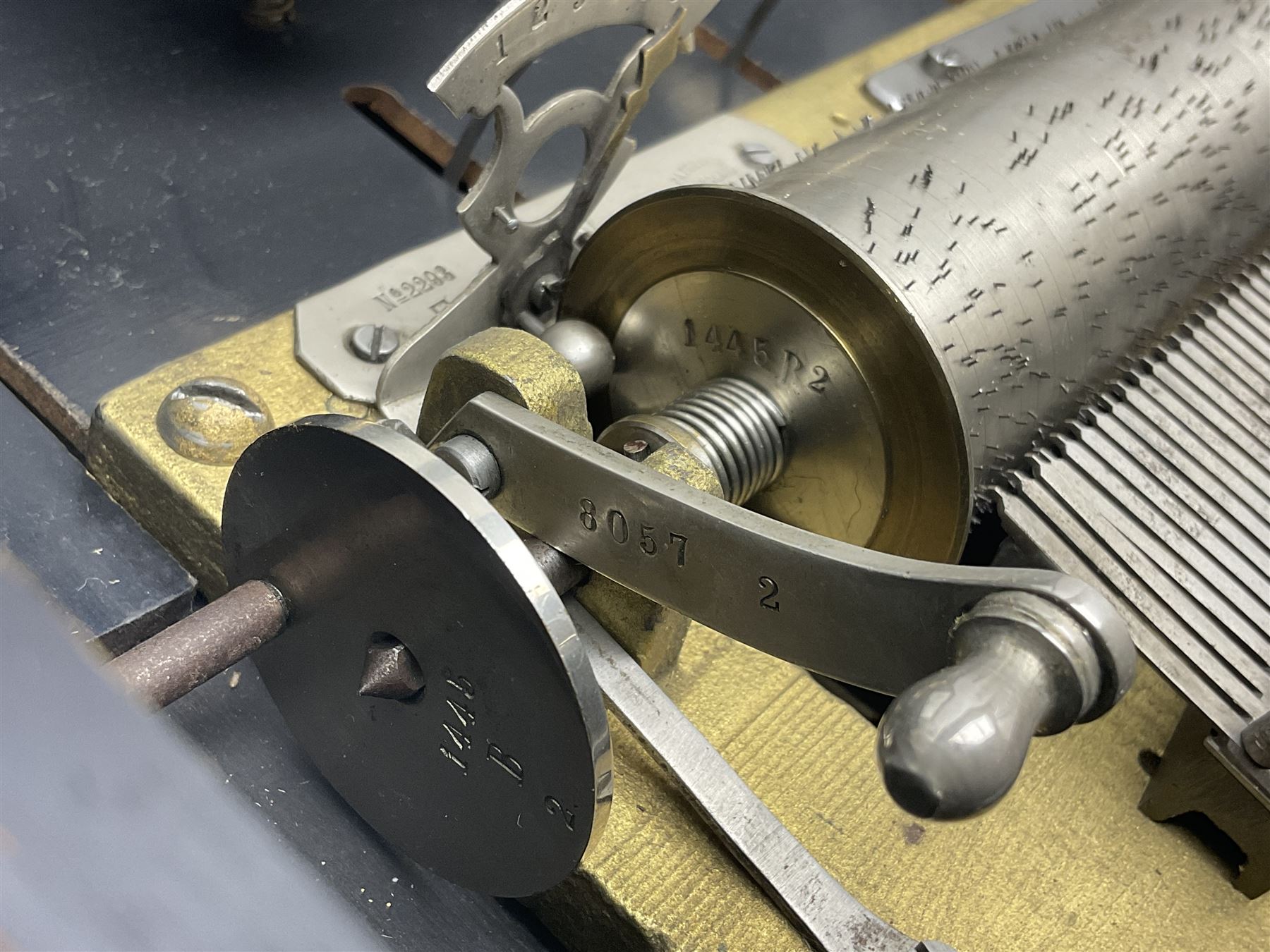 Swiss - 19th-century cylinder music box with three butterfly bells in sight, in a mahogany case with two separately boxed  6” cylinders, glazed viewing lid, 41 tooth comb (one tooth broken) crank key missing, movement untested.