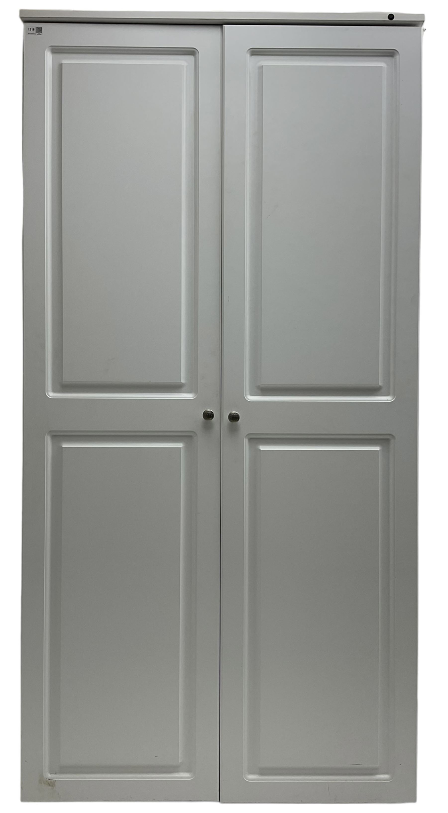 Large white finish sewing cabinet, enclosed by two doors fitted with thread holders and shelves, the interior fitted with shelves and sliding trays, with fold down work surfaces 