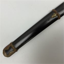 WW2 Japanese Army officer's shin gunto/katana sword with 68.5cm steel single edged blade, foliate cast brass tsuba, bound fish-skin grip with brass mounts, inscribed marks to both sides of tang; in lacquered wooden scabbard with brass mounts and locking button L97cm overall