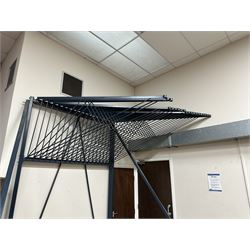 Commercial Rug Display Rack, painted steel, 20 swing arms, can fit 40 rugs back to back