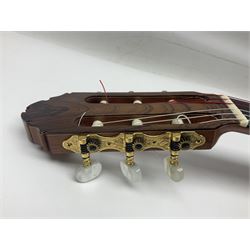 British hand made classical acoustic guitar by Huw Morgan with Indian rosewood back and sides and spruce top; bears label dated May 1998; L100cm; in Tribal Planet lightweight carrying case