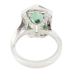 Platinum African Paraiba tourmaline and diamond ring by Scarab London, single fancy double bullet cut tourmaline of approx 8.37 carat, with round brilliant cut diamond surround and diamond set shoulders, London 2023, total diamond weight approx 1.05 carat, with Alan Poultney Gems report