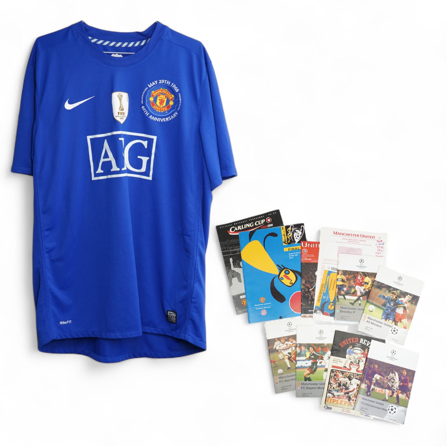 Manchester United Nike blue 40th anniversary shirt, European Cup Final programme Manchester United against Bayern Munich 1999 and other Man. Utd. programmes etc