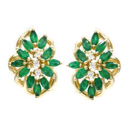 Pair of 14ct gold emerald and diamond cluster earrings, each stud set with twelve marquise...