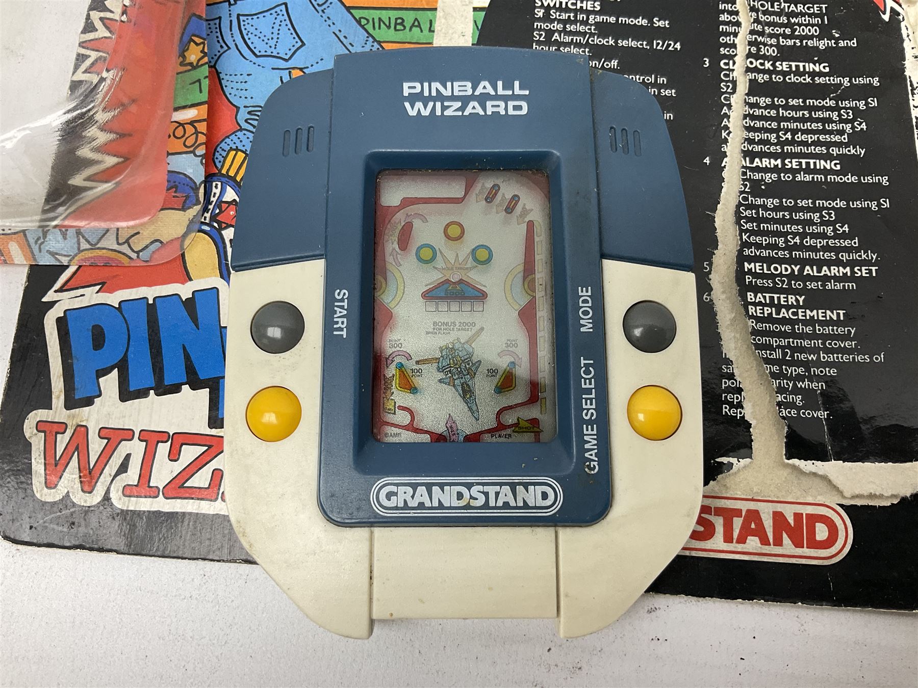 Collection of retro handheld games, including Nintendo Game & Watch ‘Snoopy Tennis’ (1982) and ‘Squish’ (1986) both with instruction booklets, Casio CG-600 ‘Star Invader’ with box, 3 in 1 LCD cartridge game including ‘Soccer’, ‘Invader’ and ‘Bomb Finder’ games, and two Grandstand ‘Pinball Wizard’ (1988) games, both with original boxes