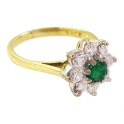 Gold emerald and round brilliant cut diamond cluster ring, stamped 18ct, total diamond weight approx 0.50 carat