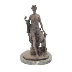 Bronzed figure 'Diana with a Dog', signed F.Preiss, upon an oval marble plinth, H46.5cm