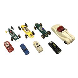 German Schuco Examico 4001 tin-plate clockwork model car with cream body work, steering wheel and gear stick; repainted Schuco die-cast BMW; three Minic Motorways cars; and three Scalextric Formula 1 racing cars; all unboxed (8)
