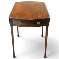 Small early 19th century George III mahogany Pembroke table of small proportions, the oval drop-leaf top with mahogany banding, fitted with twin opposing bow-fronted frieze drawers with brass pull handles, on square-tapering supports with spade feet