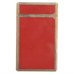 Two S.T. Dupont lighters, comprising red laque-de-chine example, boxed and a gold-plated textured example