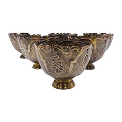 Set of six Ottoman Turkish silver zarfs or coffee cup holders, probably 19th century, the bowls with shaped rims and embossed and pierced decoration, upon stepped circular feet, D6cm H5cm