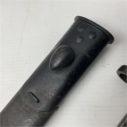 WWI British 1907 pattern bayonet, the 43cm fullered blade by Wilkinson with various marks to the ricasso; in leather covered scabbard numbered 294 to the throat and stamped M/58 L58.5cm overall