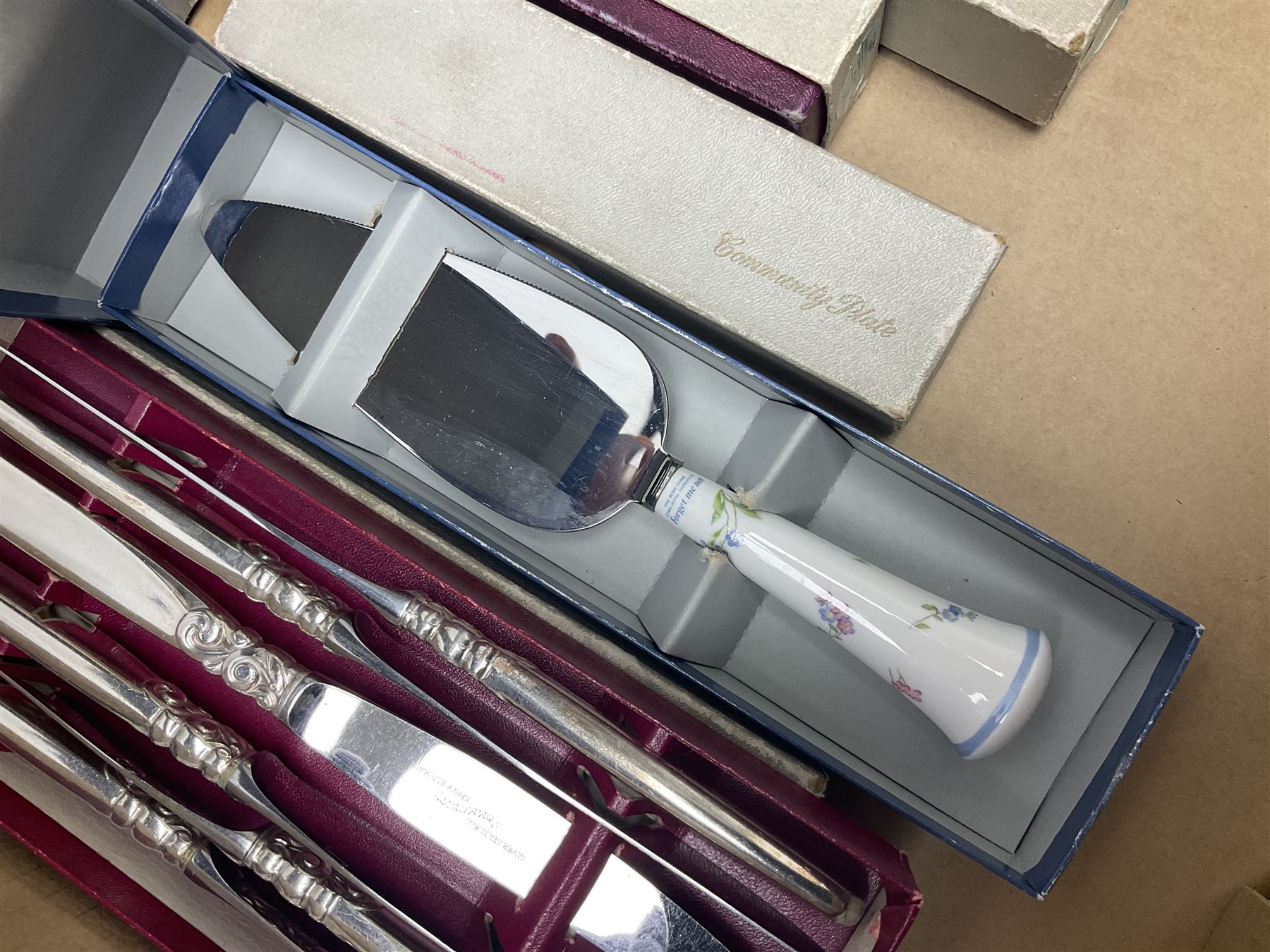 Quantity of silver plated and other metal ware to include Community cutlery and brass, together with Polaroid tv etc in three boxes