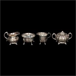 Silver plated four piece melon-shaped tea service by Viners Sheffield, comprising teapot, hot water jug, milk jug and covered sucrier, together with another silver plated tea service 