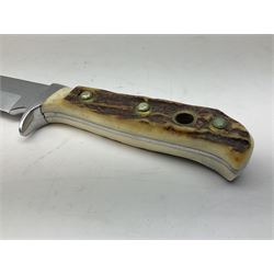 German Original Puma-Bowie knife, with maker's name and number 6396 to the 16.5cm blade, stamped number 73373 to the guard, antler grip, in original hard plastic case with brown leather sheath, also marked Puma