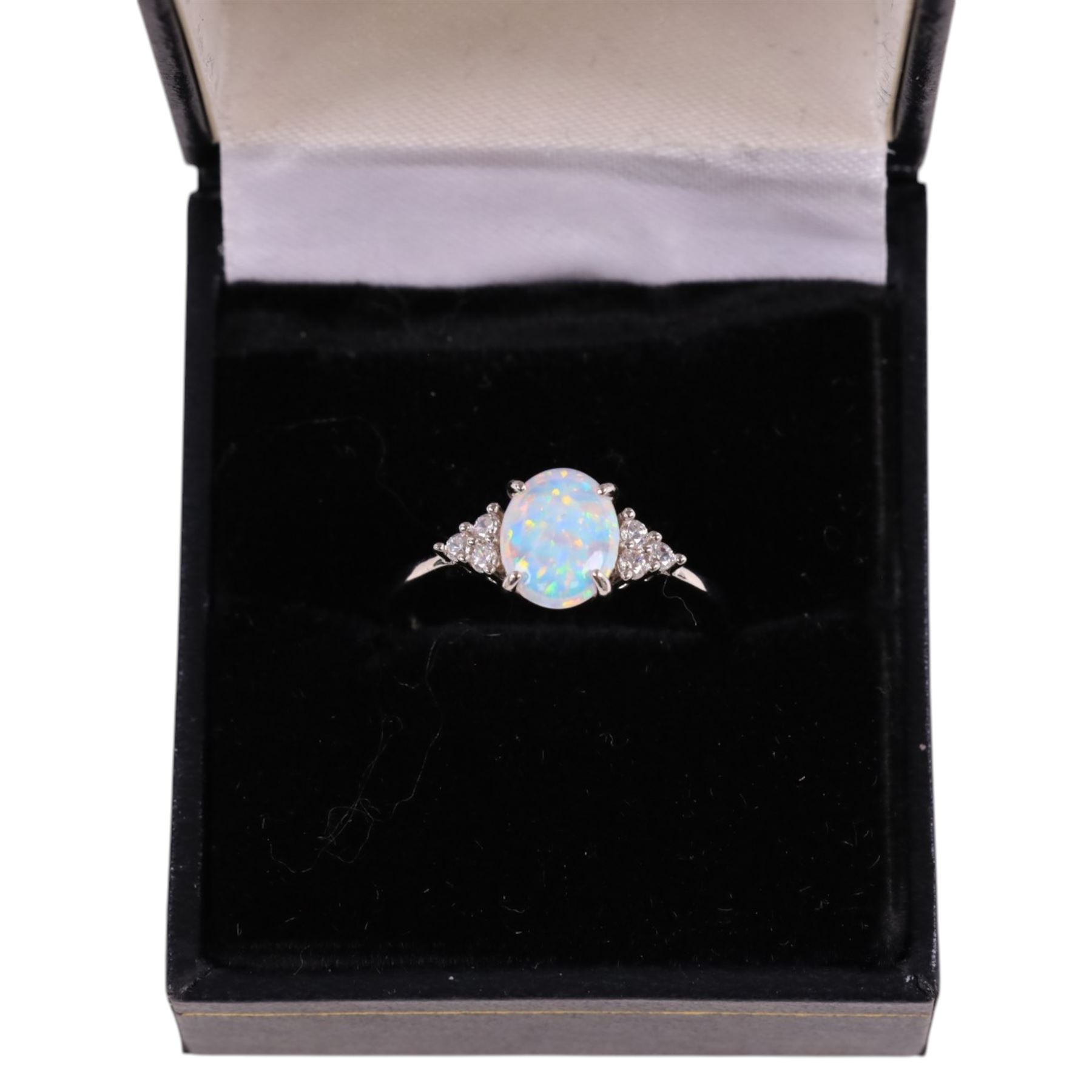 Silver opal and cubic zirconia cluster ring, stamped 925, boxed