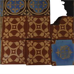 Minton & Co, Gothic Revival polychrome encaustic floor tiles, circa 1850, including six decorated with a central cardinal quatrefoil upon a blue ground, boarder tiles with scrolling vines and similar