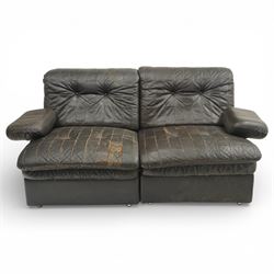 Mid 20th century leather upholstered two-piece sectional sofa with footstool, buttoned bac...