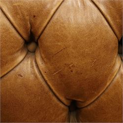 Distinctive Chesterfields - traditional shape four seater Chesterfield sofa, the rolled back and arms upholstered in deep-buttoned tan leather with matching loose seat cushions, raised on six turned supprorts