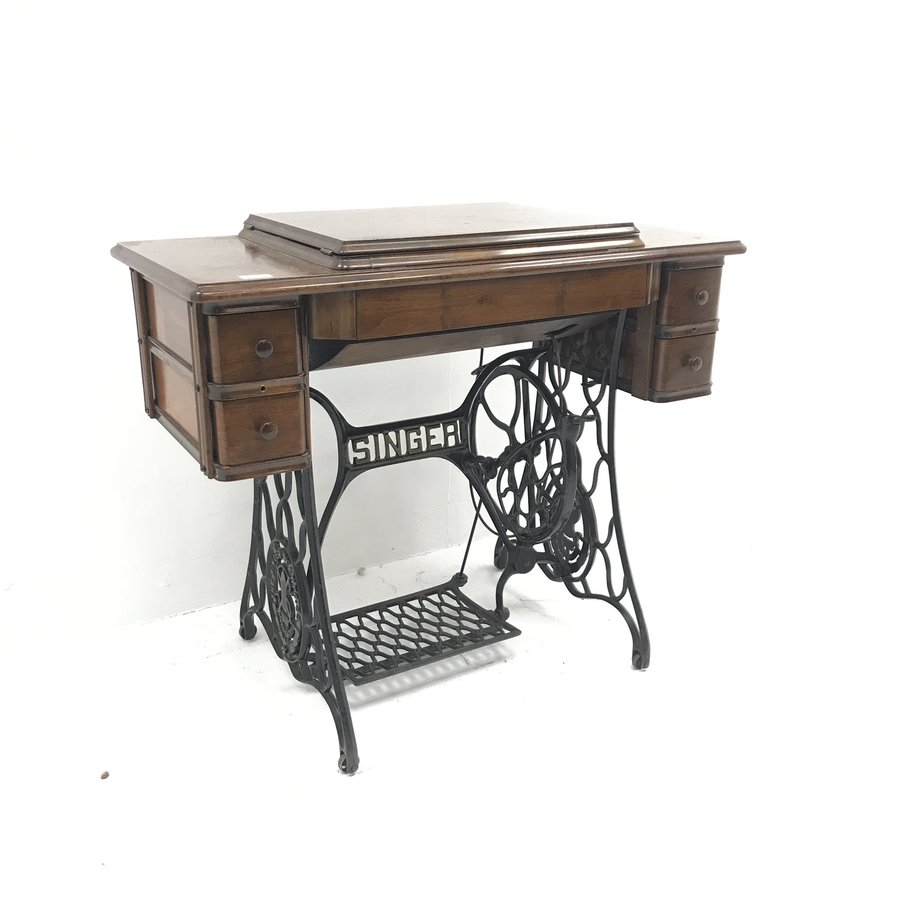 Singer Treadle sewing machine, four drawers, wrought iron base, W91cm