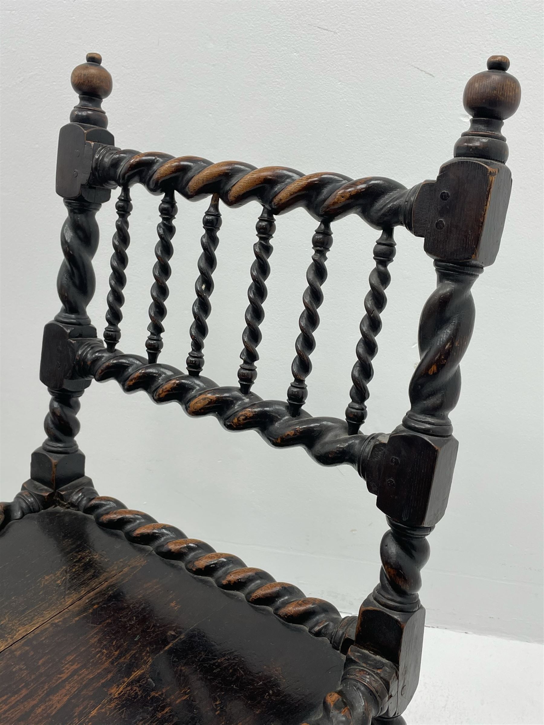 Unusual pair late 17th century oak spindle-back chairs, barley twist or spiral turned throughout, the back with a row of six vertical turned spindles, the supports joined by two lower rails and front central rail, plank seats

Provenance - The chairs illustrated in 'Early British Chairs and Seats 1500-1700' by Tobias Jellinek (Pub: Antique Collectors Club. 2009. p 313). Previous part of a private collection. Vendor purchased from auction 2014.

Measurements - seat width - 48cm, seat height - 38cm/36cm, depth - 50cm, total height - 85cm/82cm