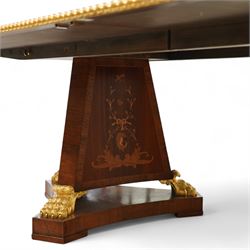 Arthur Brett & Sons - late 20th century twin pedestal dining table in the Second Empire style, the oval Amboyna burl veneered top, bordered with tulipwood crossbanding and delicate floral marquetry inlay, and rosewood crossbanded outer border within gilt gadrooned edge, over two mahogany triform pedestal bases with rosewood crossbanding and decorated with neoclassical marquetry of tied ribbons, leafy sprays, and scrolling acanthus decoration, raised on carved and gilded lion paw terminals on plinth bases, underside with maker's label